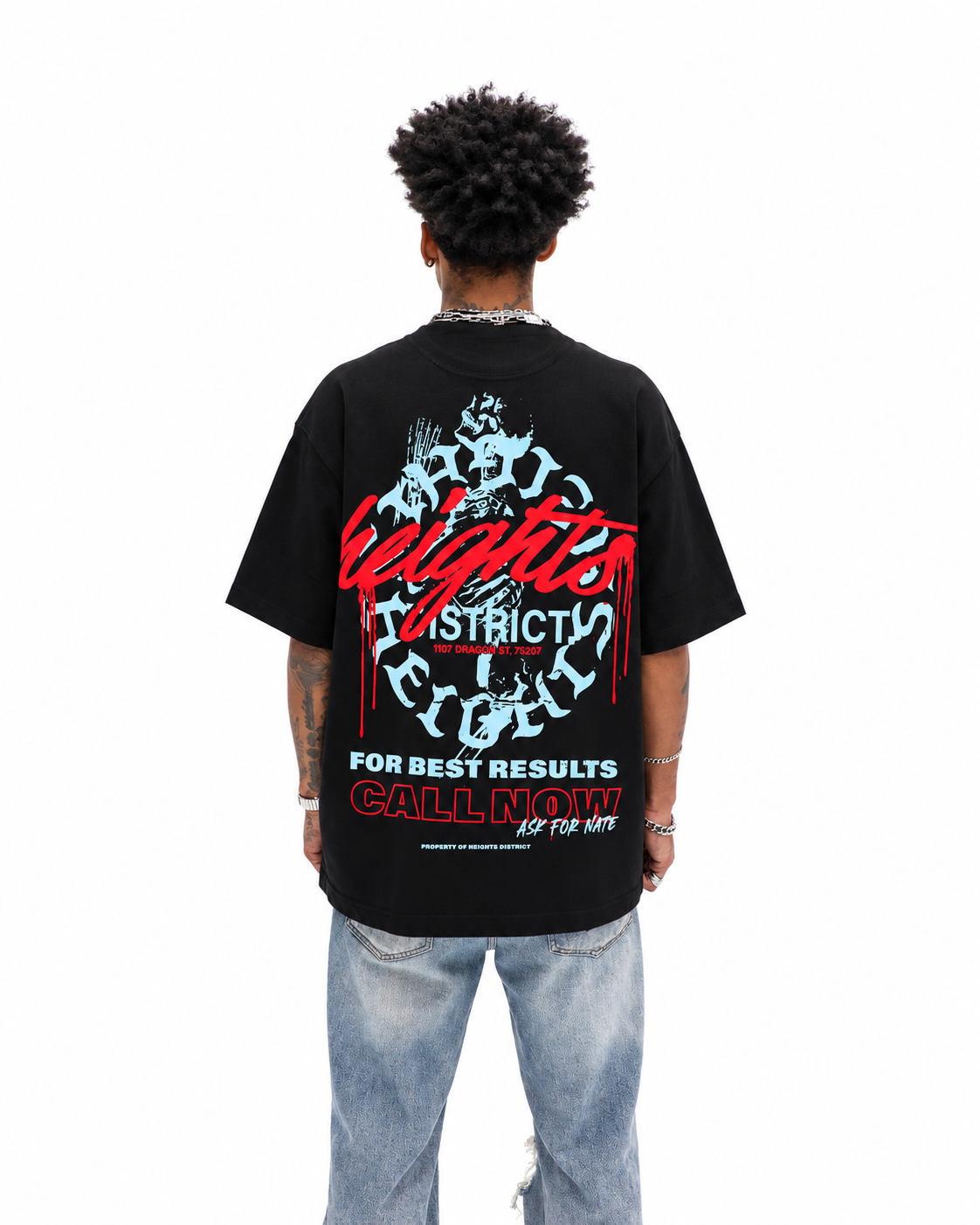 Call Now Tee worn on model, back view, powder blue print, white background