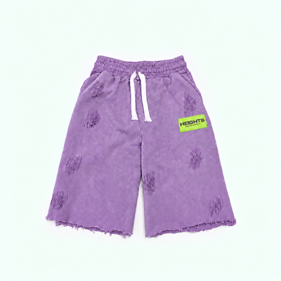 Heights Essential Short flat lay in Vintage Purple — neon green woven label, distressed 450 GSM fleece, raw-cut hem