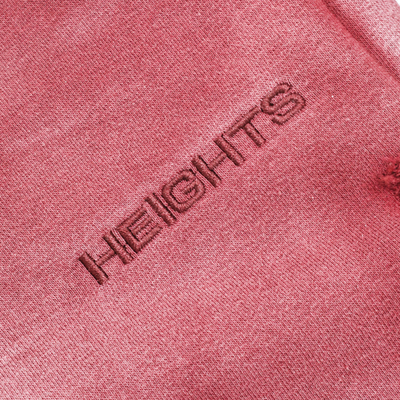 HeightsDistrict Essential Fleece Flares 2.0 pants featuring cozy fleece fabric and a stylish flare-leg design.